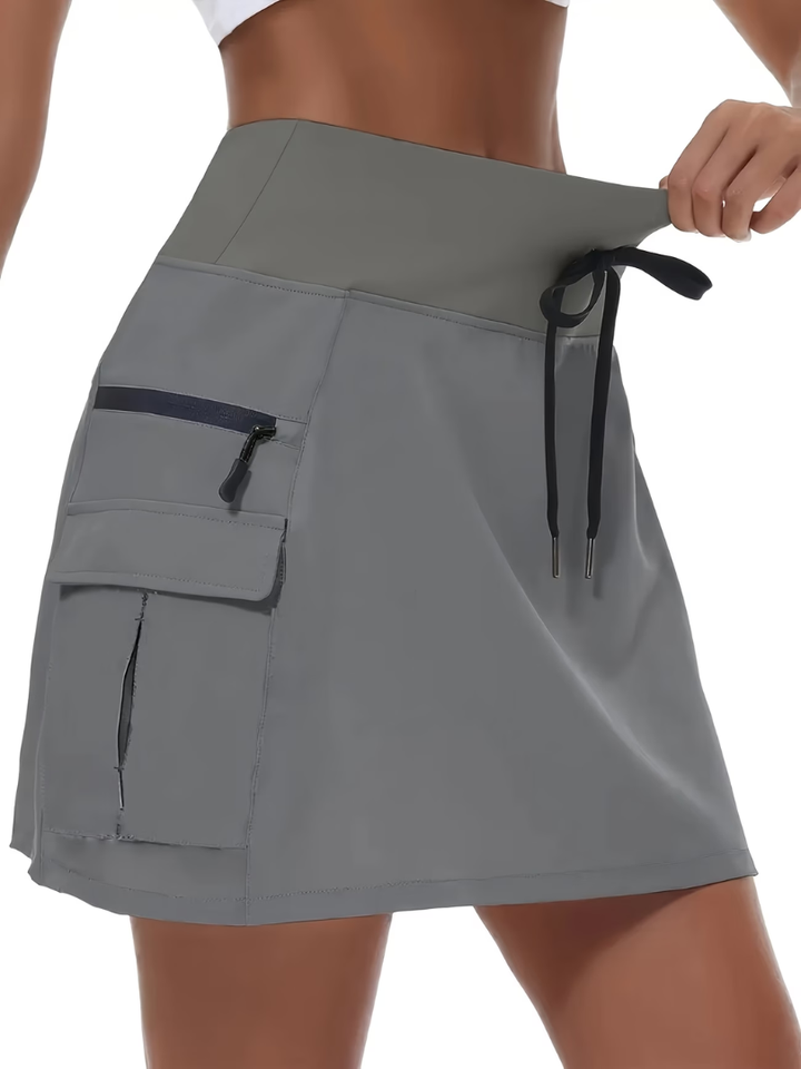 Janet high-waist active skort in light grey with zip cargo pocket