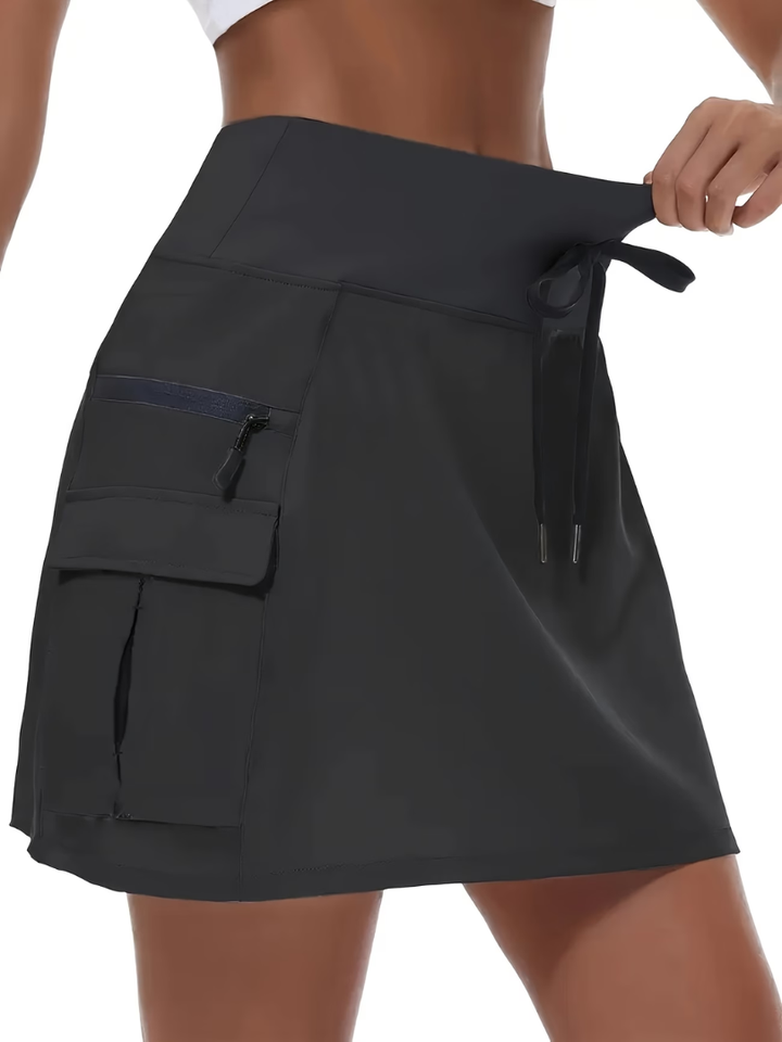 Janet high-waist active skort in black with zip cargo pocket