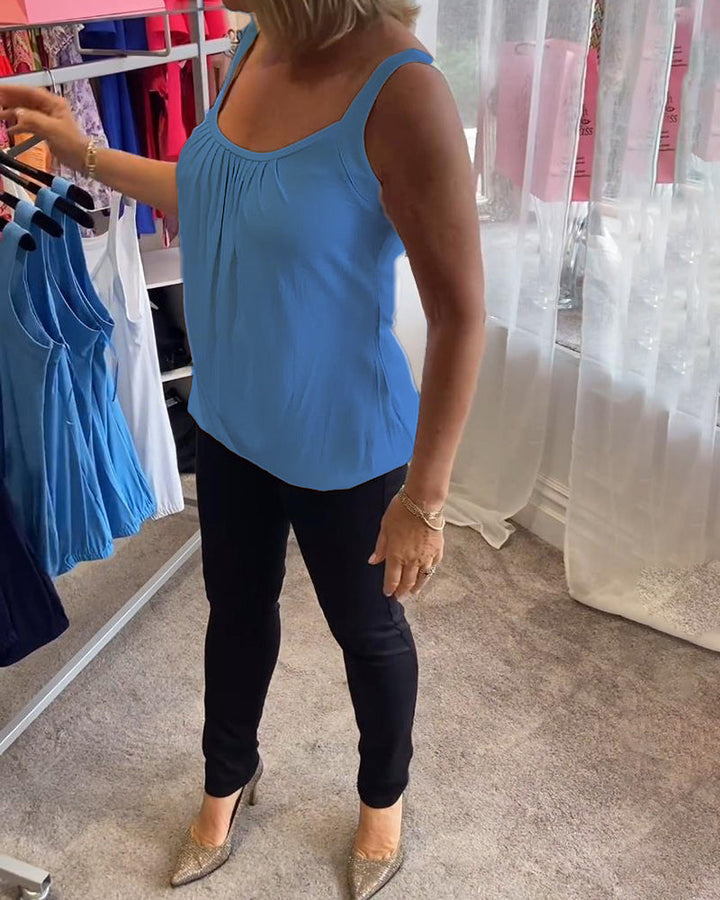 Nancy pleated sleeveless top in blue, side view