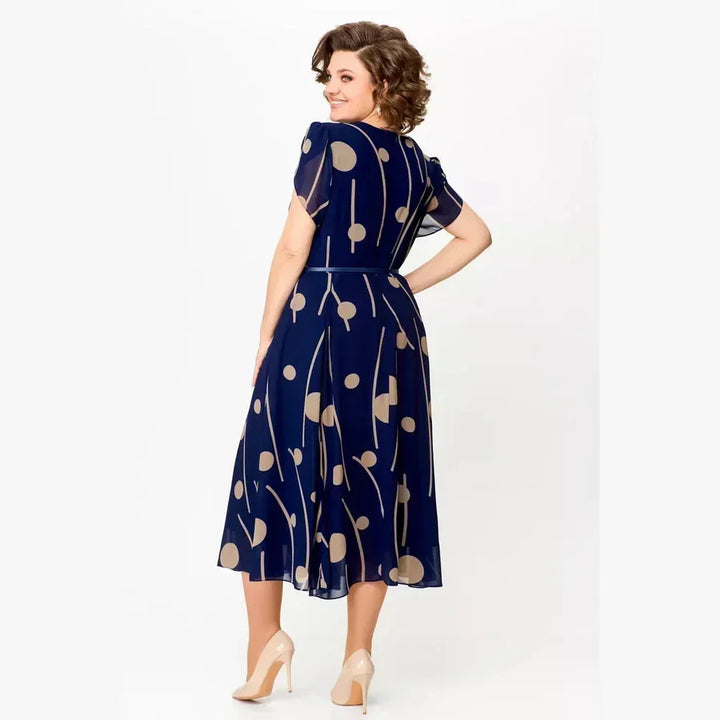 Evelyn navy polka dot midi dress, styled detail