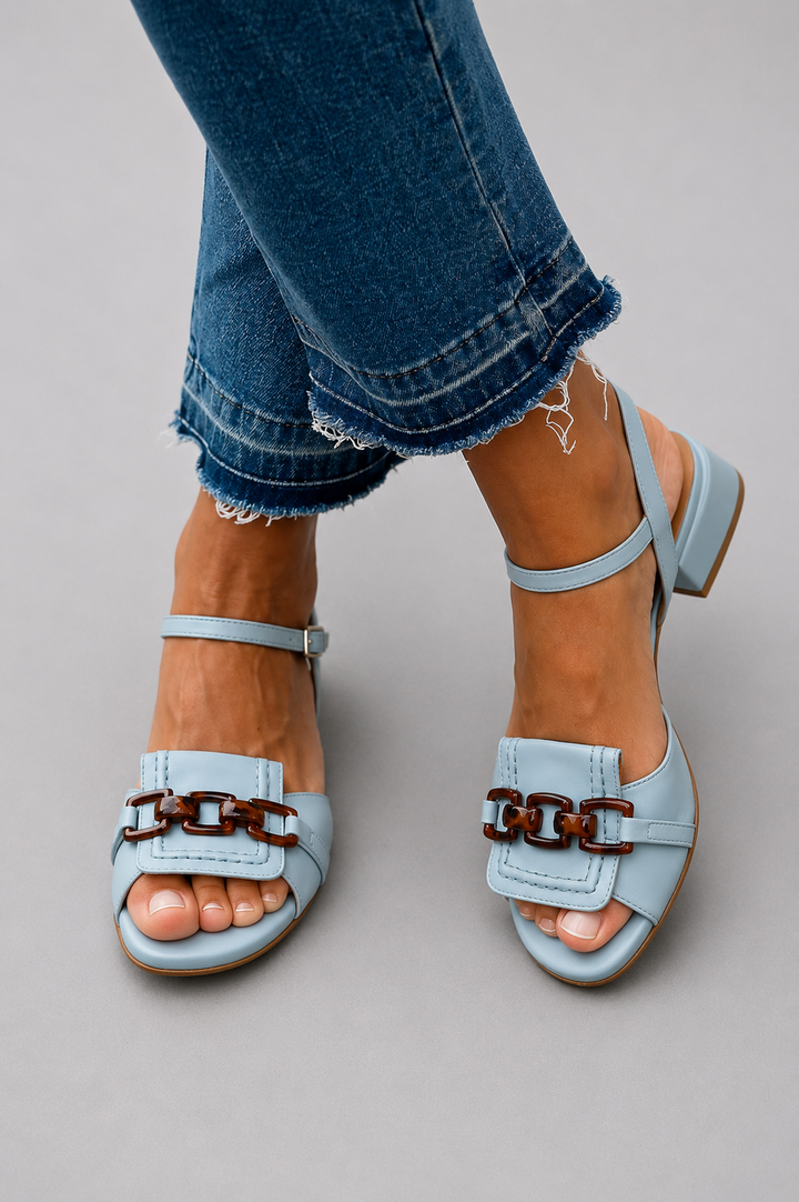 Florence chain buckle sandals worn on foot